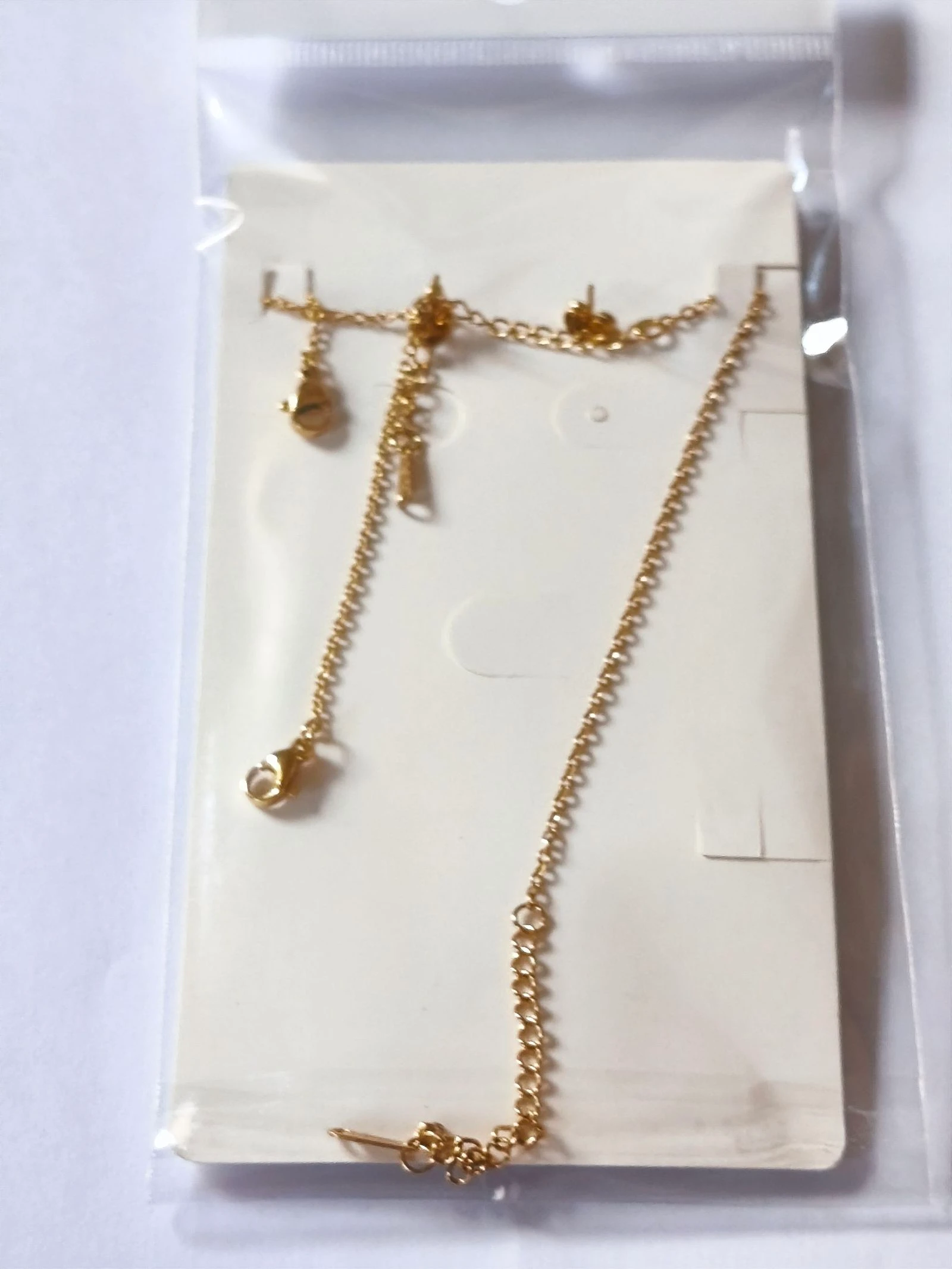 Set de choker, armband en klavertjesoorhangers – photo 3